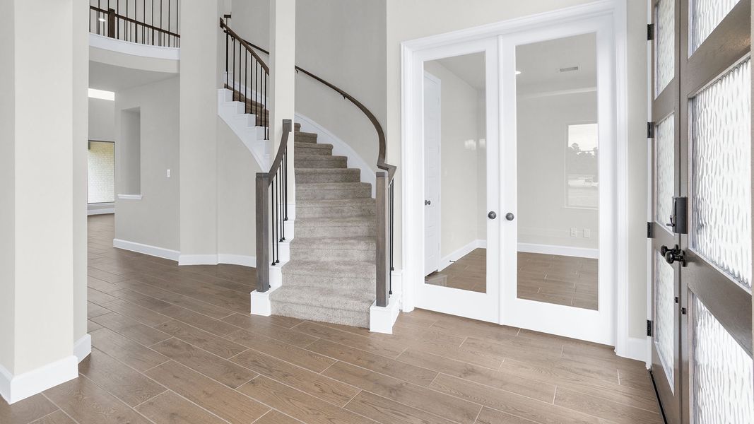 Spacious, unfurnished interior of a new home in Legacy Prairie at Katy Court, Katy (Image 23).