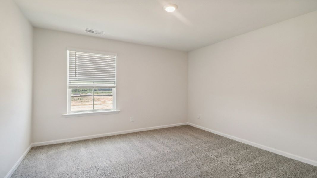 Representative unfurnished interior of a home built from the ROBIE by D.R. Horton in Gates Village, Lugoff (Image 26).