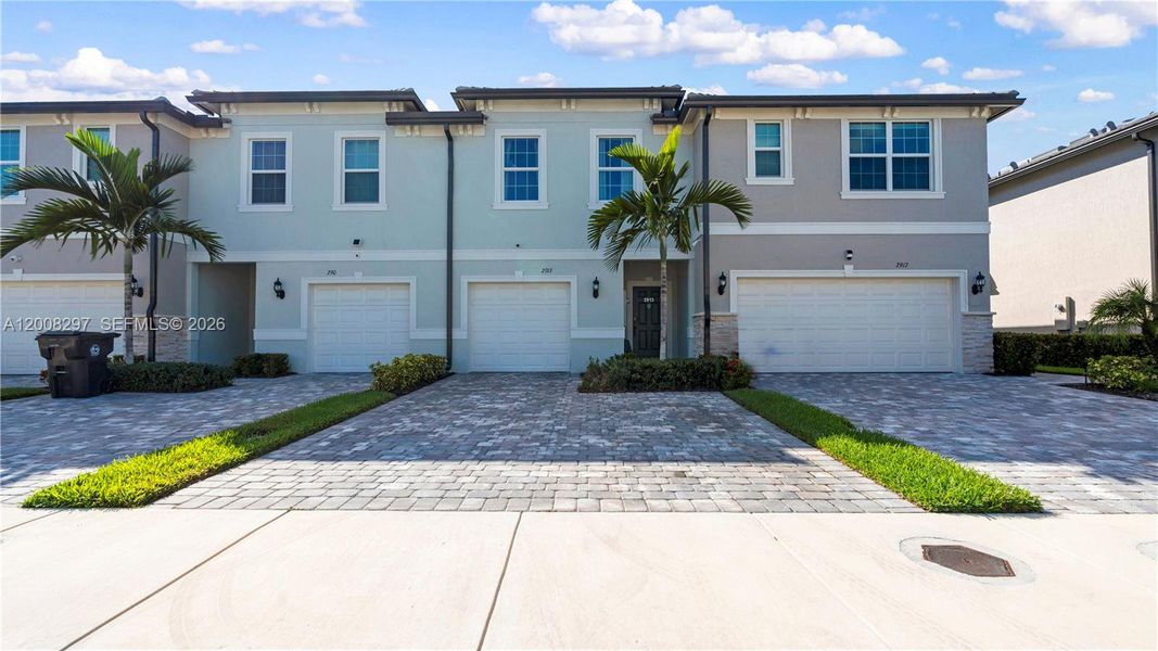 Front exterior of a new home in , Lauderdale Lakes, FL, highlighting curb appeal (Image 26).