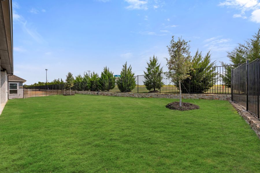 Exterior details and patio area of a home in Nelson Lake Estates, Rockwall (Image 23).