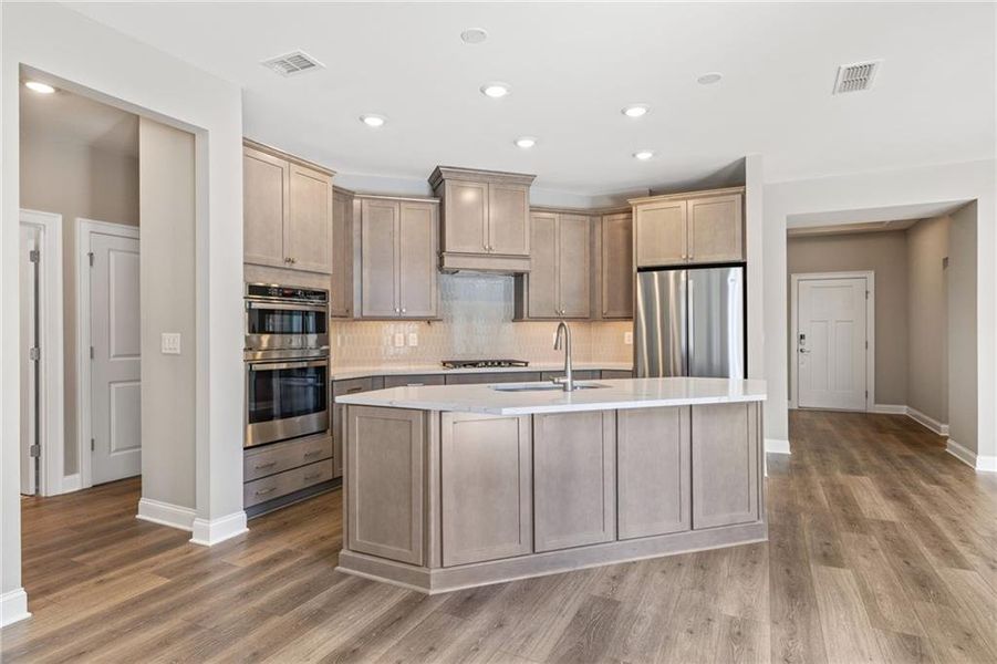 Furnished interior view inside a new home in The Courtyards at Bailey Farm, Dacula (Image 11).
