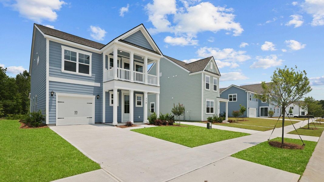 Front exterior of a new home in Sheep Island, Summerville, SC, highlighting curb appeal (Image 2). Front exterior of a new home in Sheep Island, Summerville, SC, highlighting curb appeal (Image 2).