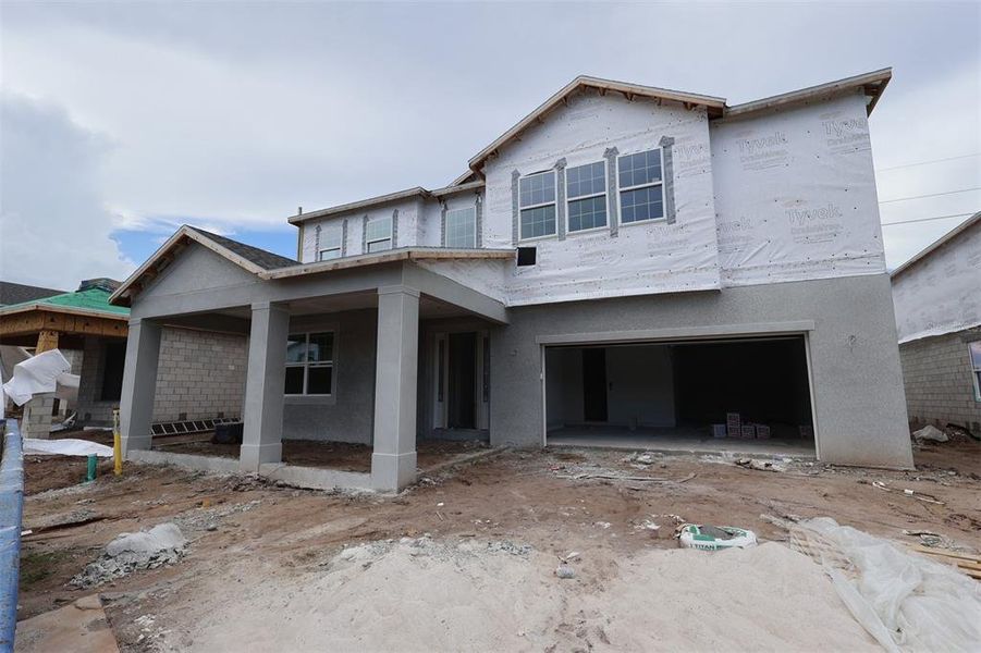 In-progress construction of a new home in Center Lake on the Park, St. Cloud, FL (Image 4).