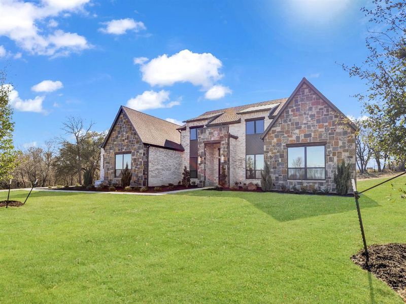 Front exterior of a new home in , Weatherford, TX, highlighting curb appeal (Image 26).