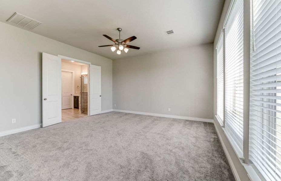 Representative unfurnished interior of a home built from the 3798 by Ravenna Homes in The Woodlands Hills 65′, Willis (Image 32).
