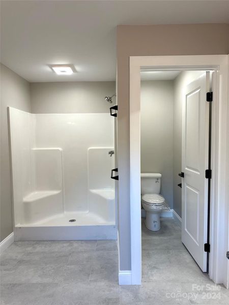 PRIMARY BATH SHOWER & WATER CLOSET