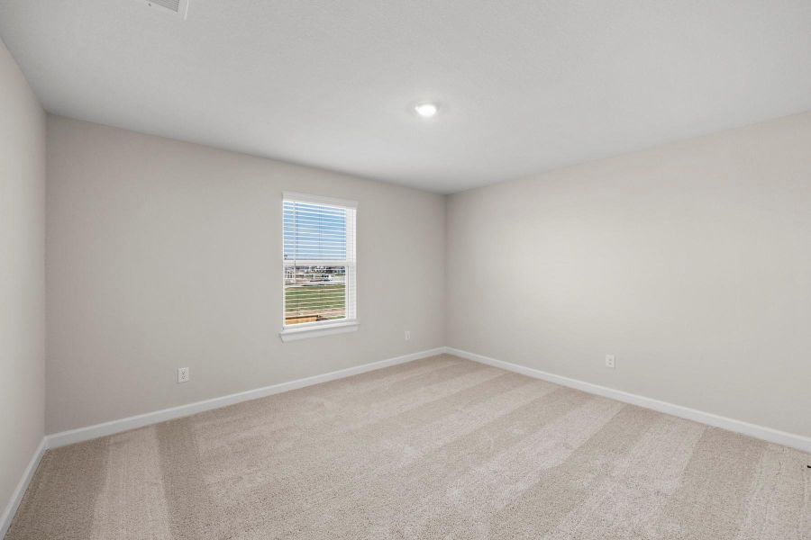Spacious, unfurnished interior of a new home in Sunterra, Katy (Image 9).