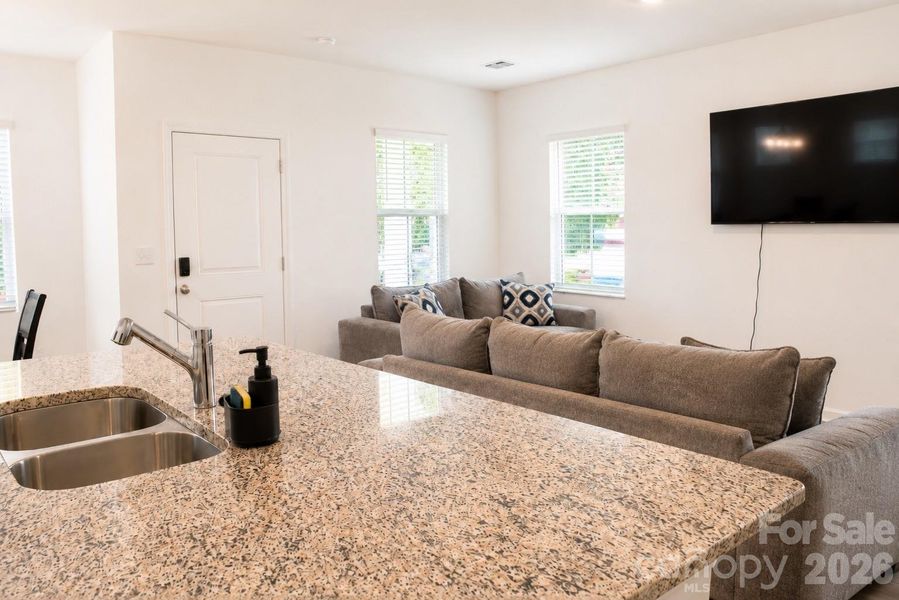 Furnished interior view inside a new home in Autumn Park, Concord (Image 8).