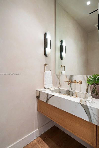 Gorgeous Powder Room With Integrated Sink