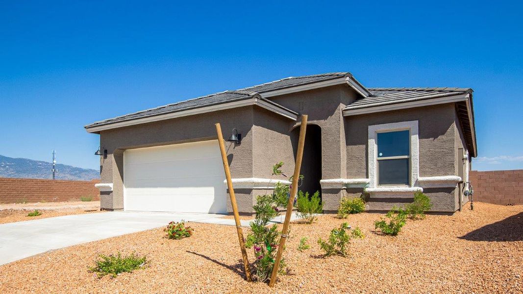 Representative exterior photo of a completed home built from the Baxter - Plan H35B by D.R. Horton in Tortolita Trails, Marana, AZ (Image 2).