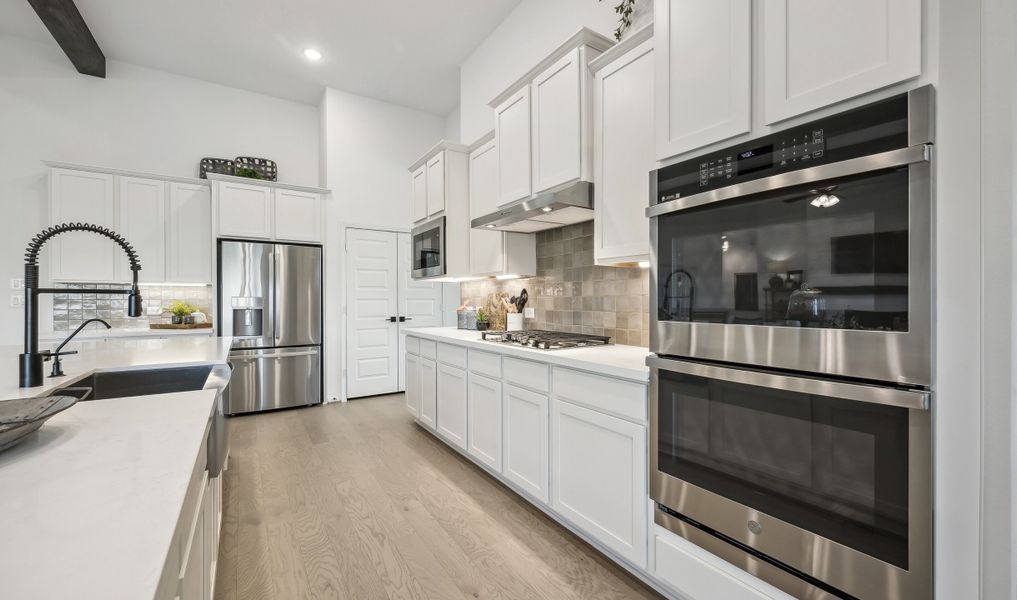 Palatial kitchen with stainless-steel appliances