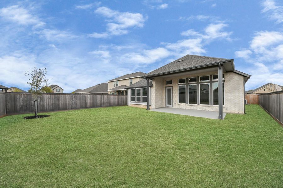Exterior details and patio area of a home in Bridgeland: Heritage Collection, Cypress (Image 4).