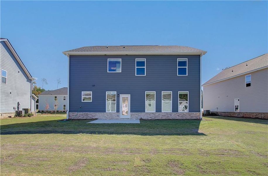 Front exterior of a new home in Westminster, Covington, GA, highlighting curb appeal (Image 14). Front exterior of a new home in Westminster, Covington, GA, highlighting curb appeal (Image 14).