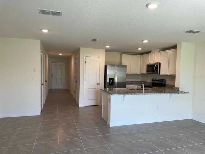 Furnished interior view inside a new home in , St. Cloud (Image 4).