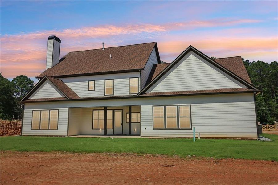 Front exterior of a new home in , Lilburn, GA, highlighting curb appeal (Image 37).