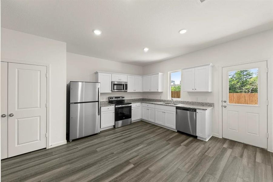 Furnished interior view inside a new home in Meadow Park, Melissa (Image 5).