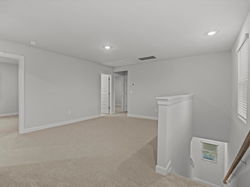 Spacious, unfurnished interior of a new home in Brayfield Manor - Heritage Collection, Wellford (Image 11).