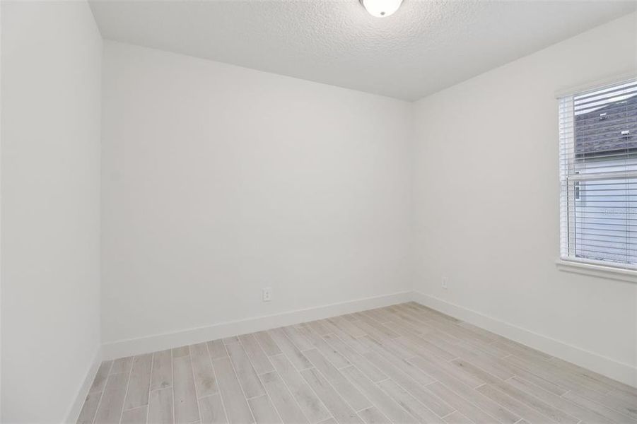 Spacious, unfurnished interior of a new home in Ridgehaven - Reserve Series, Ormond Beach (Image 36).