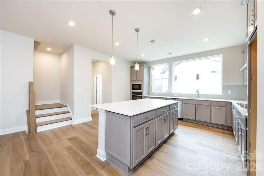 Gourmet Kitchen with Rich Grey Cabinets