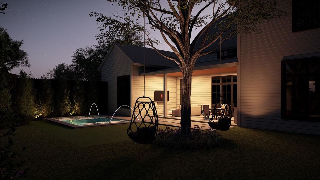 Pool at dusk with a patio area and a hot tub