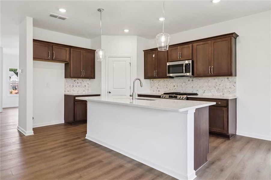 Furnished interior view inside a new home in Eastlyn Crossing, Flowery Branch (Image 8). Furnished interior view inside a new home in Eastlyn Crossing, Flowery Branch (Image 8).