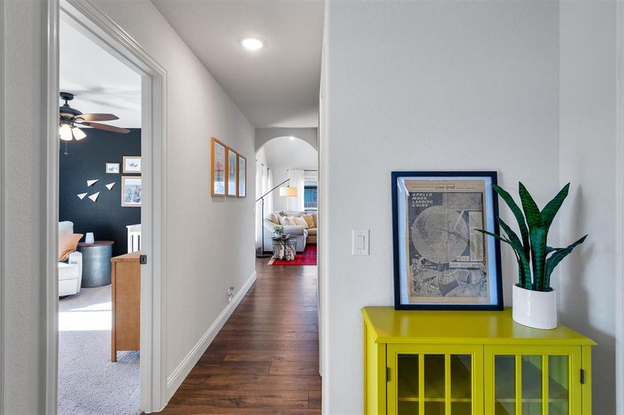 Corridor featuring dark hardwood / wood-style flooring