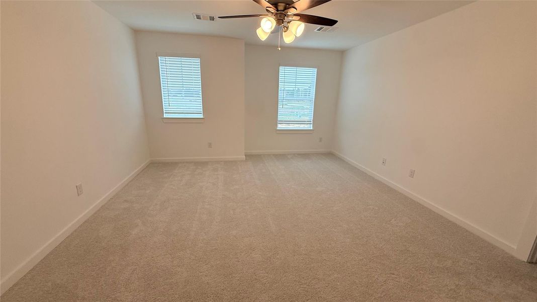 Spacious, unfurnished interior of a new home in Seven Oaks Townhomes, Tomball (Image 5).