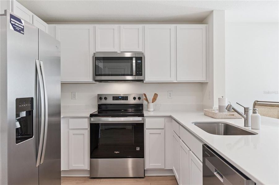 Furnished interior view inside a new home in Sandalwood, New Smyrna Beach (Image 13).
