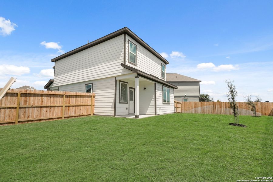 Exterior details and patio area of a home in Melissa Ranch, San Antonio (Image 16). Exterior details and patio area of a home in Melissa Ranch, San Antonio (Image 16).