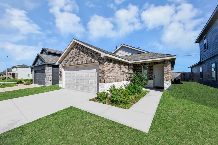 Front exterior of a new home in Legacy Park, Houston, TX, highlighting curb appeal (Image 24).