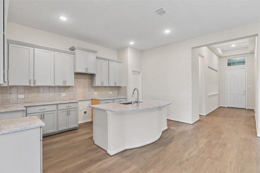 Furnished interior view inside a new home in Aldeana, Bonney (Image 7).
