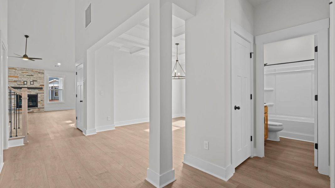 First-class entryway featuring hardwood floors and accomplished architectural style
