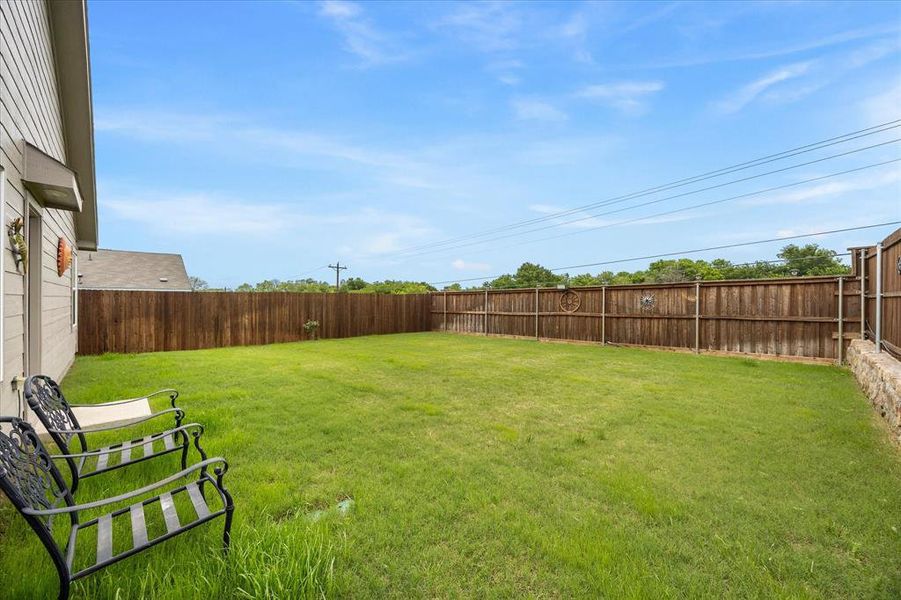Exterior details and patio area of a home in Eastland, Crandall (Image 24).