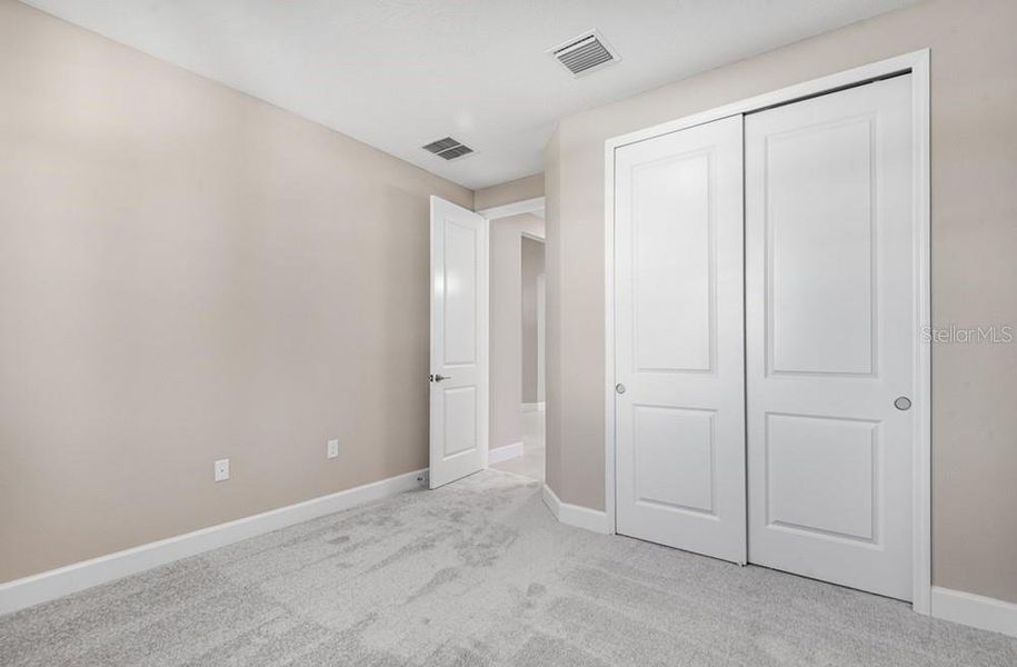 Spacious, unfurnished interior of a new home in Colbert Landings, Palm Coast (Image 16).