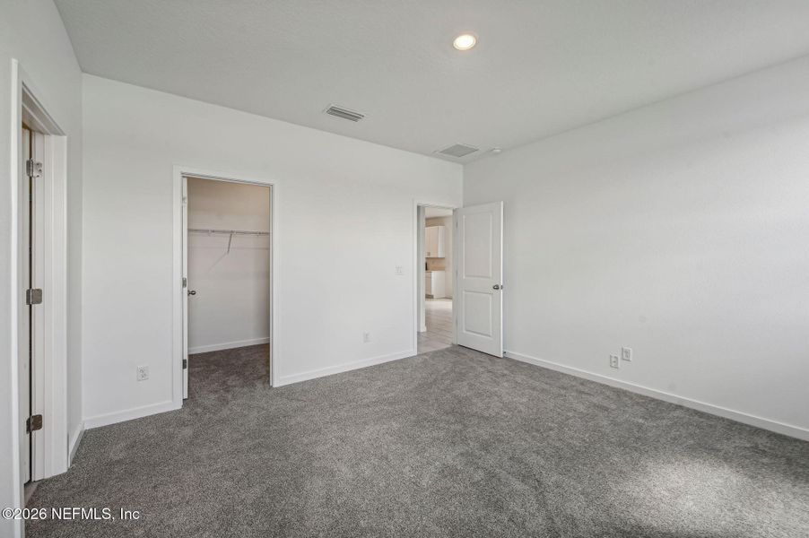 Spacious, unfurnished interior of a new home in Lakes at Bella Lago - Signature Series, Green Cove Springs (Image 15).