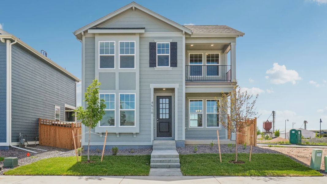 Front exterior of a new home in Timnath Lakes, Timnath, CO, highlighting curb appeal (Image 2). Front exterior of a new home in Timnath Lakes, Timnath, CO, highlighting curb appeal (Image 2).