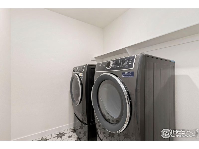 Laundry Room with washer and dryer appliances included