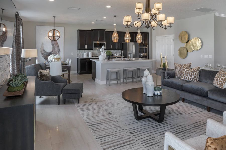 Family Room to Kitchen - Palmer in Florida by Landsea Homes