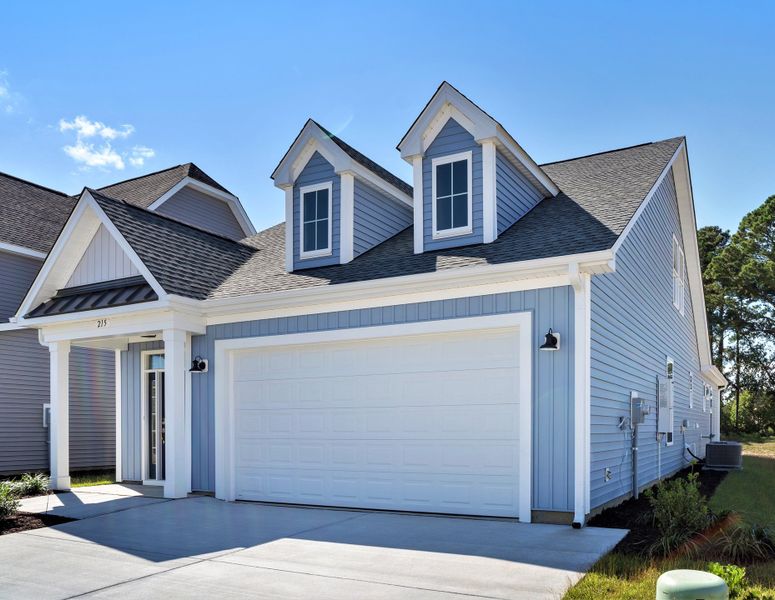 Front exterior of a new home in Terrapin, Leland, NC, highlighting curb appeal (Image 25). Front exterior of a new home in Terrapin, Leland, NC, highlighting curb appeal (Image 25).