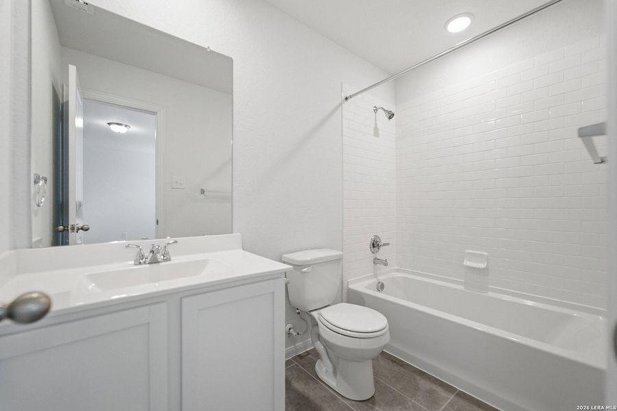 Furnished interior view inside a new home in Hennersby Hollow, San Antonio (Image 8).
