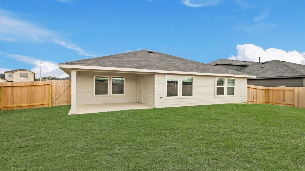 Exterior details and patio area of a home in Grand Pines, Magnolia (Image 3).