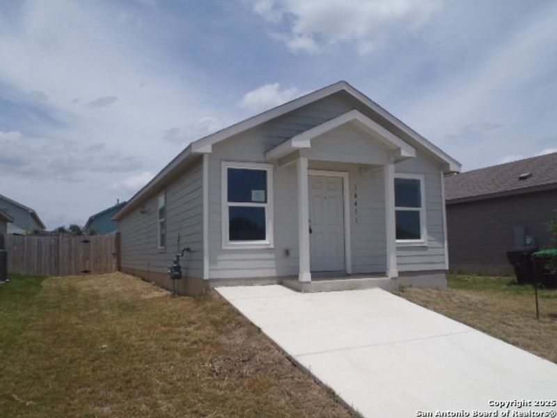 Front exterior of a new home in , San Antonio, TX, highlighting curb appeal (Image 19).