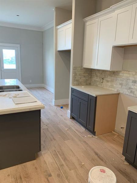 ACTUAL 1808 KITCHEN PHOTO, DARK GRAY LOWERS AND ISLAND, WHITE UPPERS, FLOOR TO BE STAINED