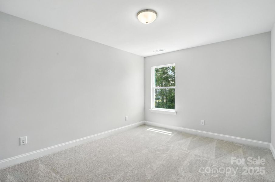 Spacious, unfurnished interior of a new home in Hampton Woods, Charlotte (Image 25).