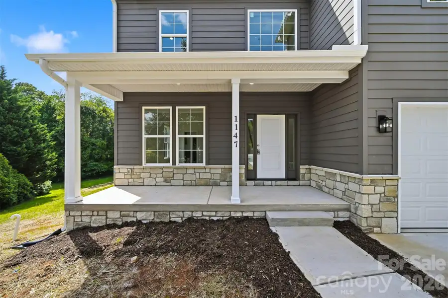 Exterior details and patio area of a home in , Hickory (Image 26).