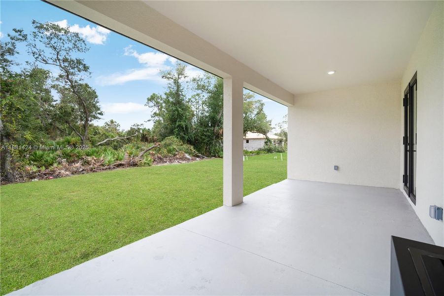 Exterior details and patio area of a home in , Port Charlotte (Image 24).