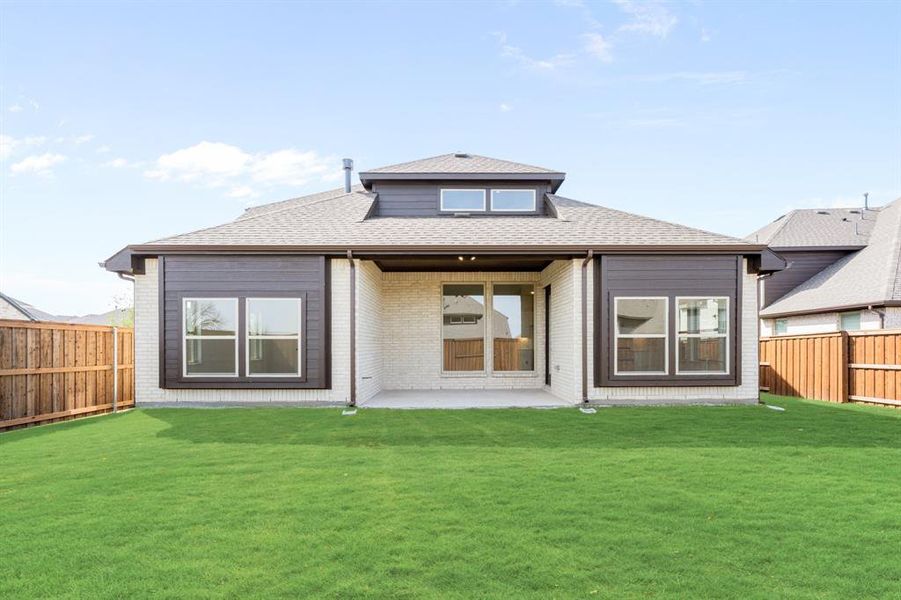 Exterior details and patio area of a home in Windsong Ranch, Prosper (Image 25).