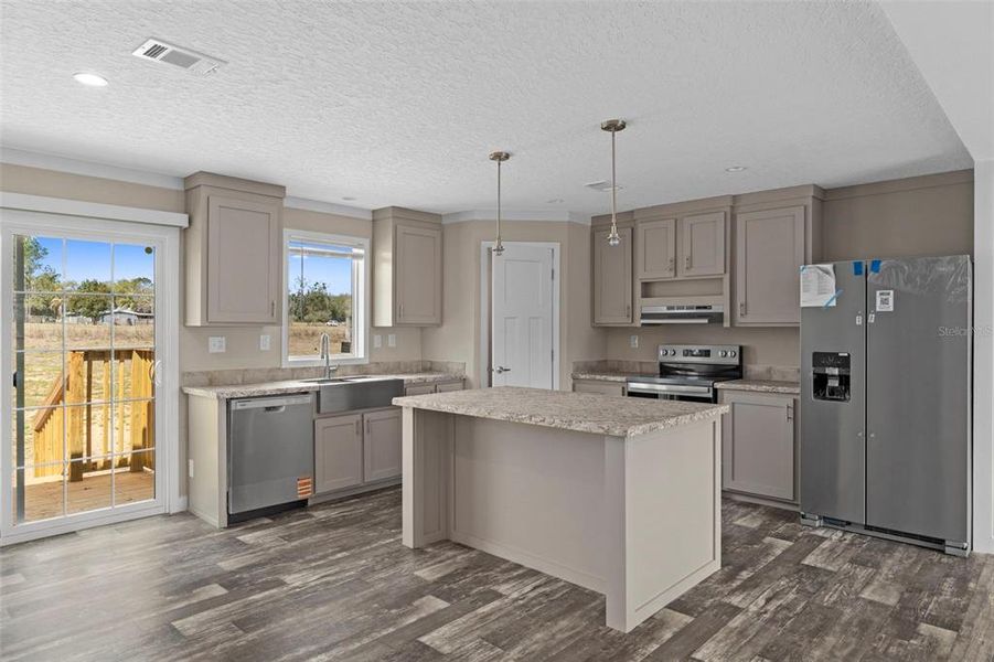 Furnished interior view inside a new home in , Dade City (Image 8).
