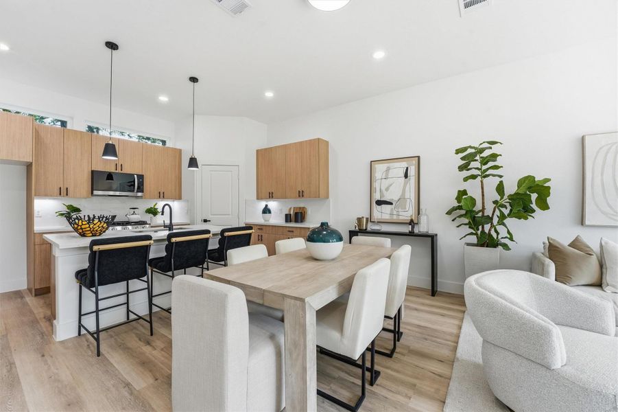 Room for dedicated dining area and additional bar stool seating, perfect for entertaining!