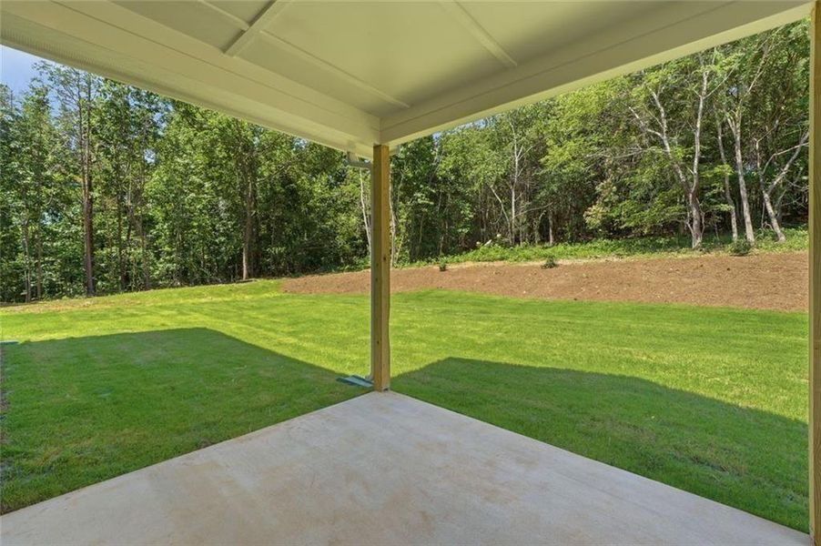 Exterior details and patio area of a home in , White (Image 24).